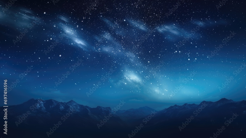 Starry night sky over mountainous landscape
