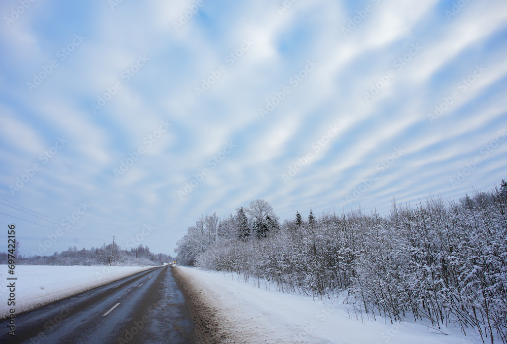 Obraz premium The altocumulus undulatus is a mid-level cloud that resemble 