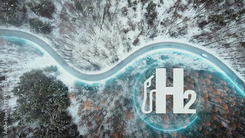 Hydrogen H2O Car producing electricity while driving on a winter forest road photo