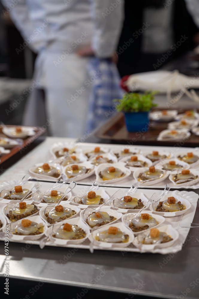 Degustation appetisers for visitors made by great chefs of high cuisine French restaurants, winter festival, Avenue de Champagne, Epernay, France