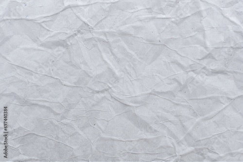 Closeup of white crumpled paper for texture ,grey paper 