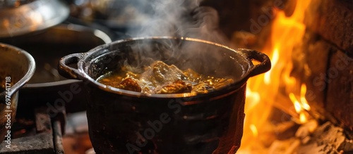 Ancient recipe for wild fowl soup, cooked in a northern boiler. photo
