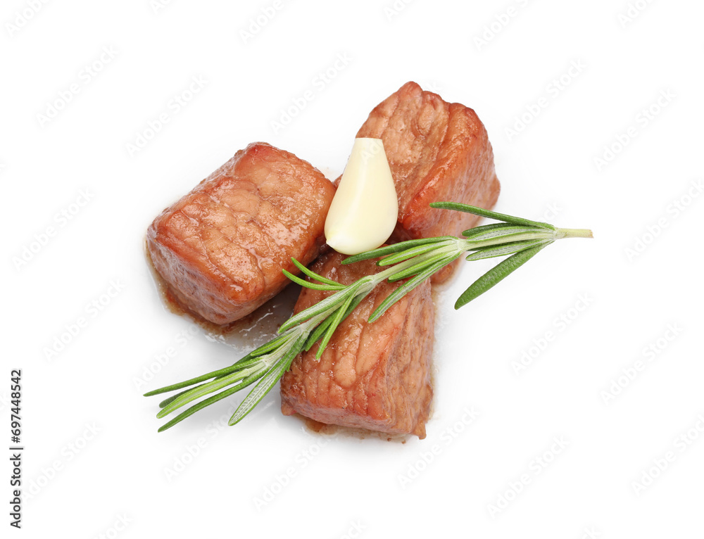 Pieces of delicious cooked beef, rosemary and garlic isolated on white, top view. Tasty goulash