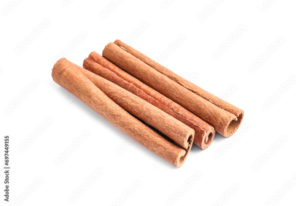 Three aromatic cinnamon sticks isolated on white Three aromatic cinnamon sticks isolated on white