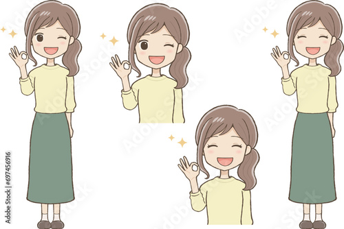 ウィンクOKサインをするロングスカート姿の女性