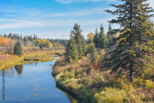 View of the Blindman River from the Trans Canada Trail in Blackfalds, Alberta, Canada photo
