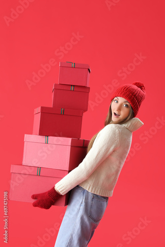 Young woman in warm hat wit...