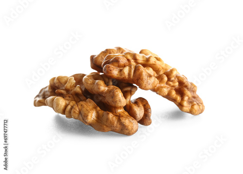 Tasty walnuts on white background