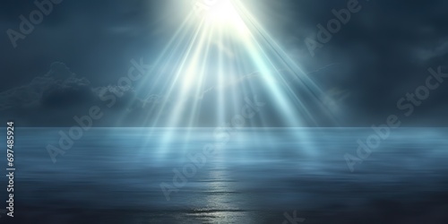 A calm sea water with beams of light from above © original logo