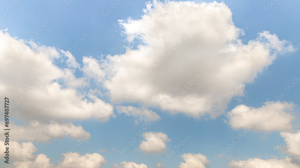 Fototapeta premium The unique beauty of a clear cloudy daytime spring sunny calm bright sky