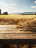 A wooden table with wheat on it placed in front of a vast wheat field