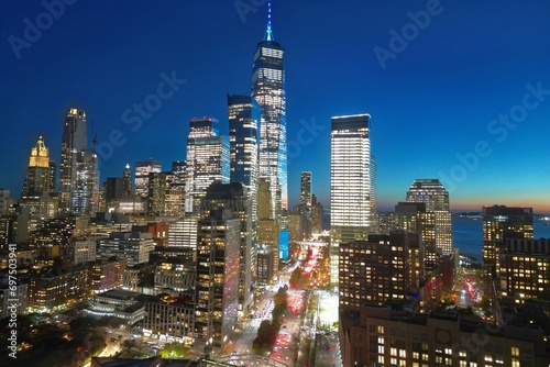 Night New York City, Manhattan famous top view. Manhattan from above. NYC panorama. NYC skyline at twilight. New York famous building. Night traffic in NYC. Lower Manhattan. Night NYC from drone.