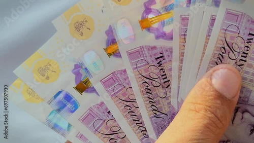 Hand with euro banknotes