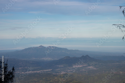 the beauty of the view at the top of a mountain in a tropical area is like a country above the clouds. a view presented when climbing an Indonesian mountain.