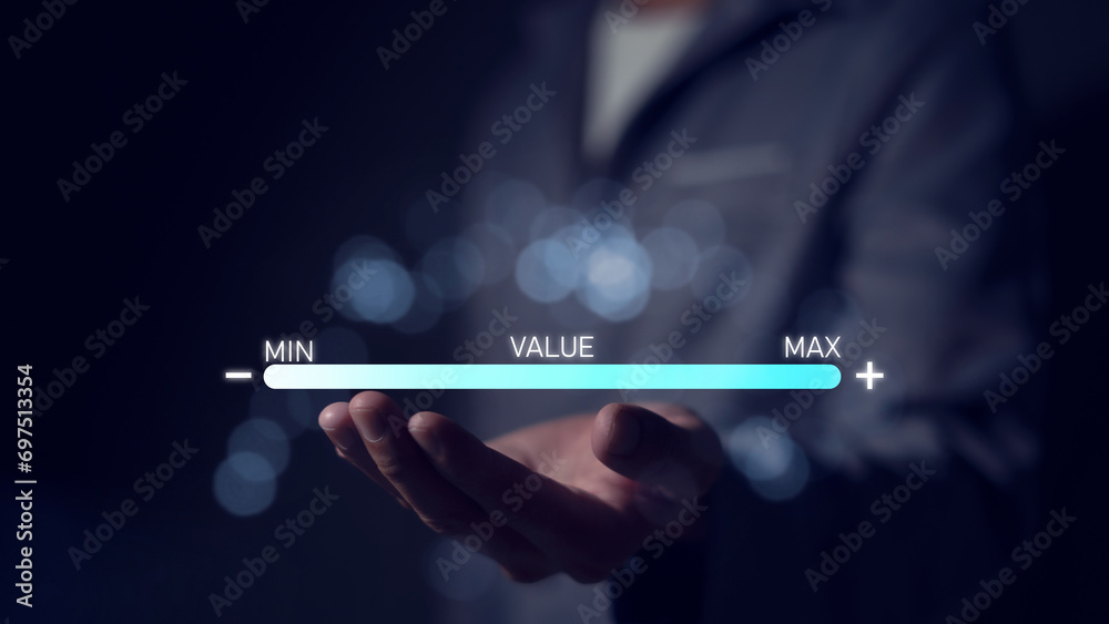Value added or business growth concept Businessman is pulling a progress bar with the word VALUE. Value, growth, increase in value, Value added or business growth concept Businessman is pulling a progress bar with the word VALUE. Value, growth, increase in value,