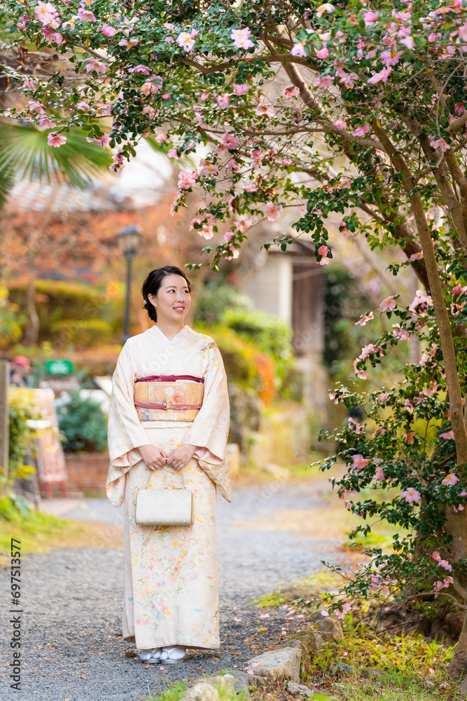 Japanese Female Kimono portrait photography with flowers in full bloom.