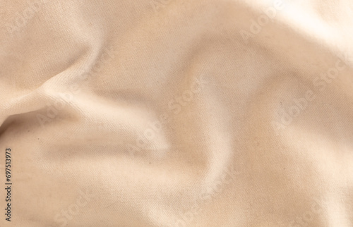 Beige fabric as an abstract background. Texture