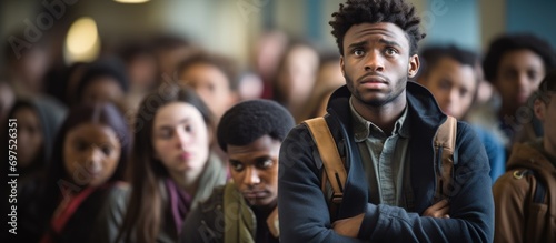 College student in classroom listening to lecture.