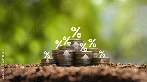 Big pile of money with up arrow and percentage symbol with green background, financial banking concept Interest rates, dividends, mortgages, business growth and green investment