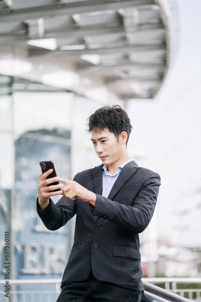 Email notification concept, Male use smartphone and laptop receive message alert in the mailbox. Email notification concept, Male use smartphone and laptop receive message alert in the mailbox.