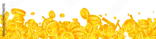 Chinese yuan coins falling. Scattered gold CNY