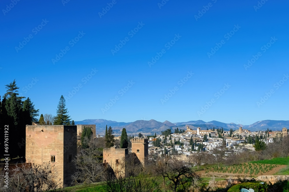 Medieval architecture of Alhambra in Granada, Spain. The famous place is a Unesco World Heritage Site. 