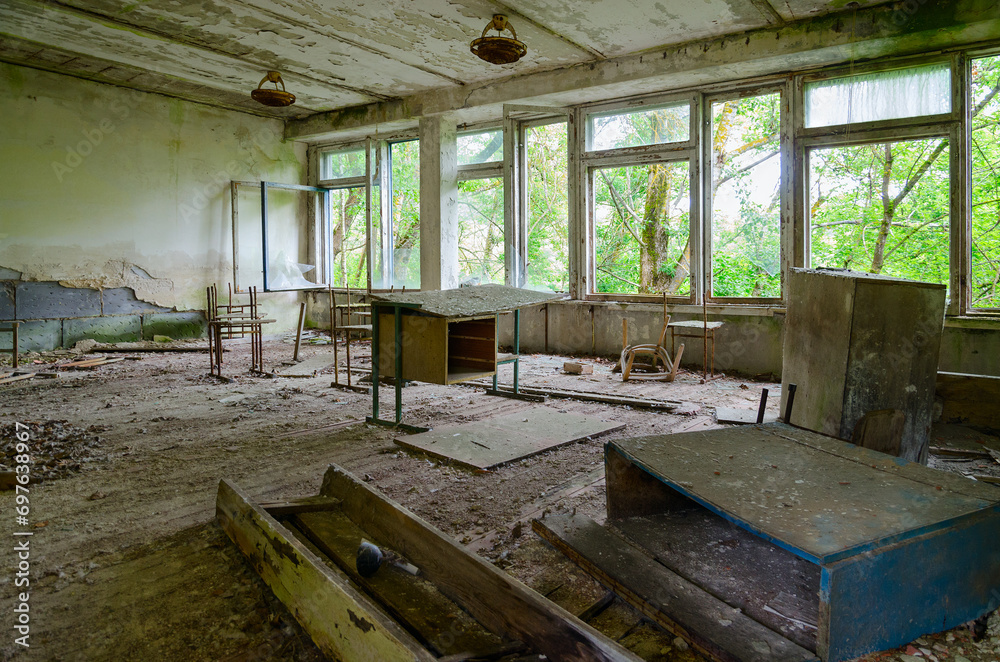 Devastation in premises of abandoned school in resettled village of Pogonnoye in exclusion zone of Chernobyl nuclear power plant, Belarus