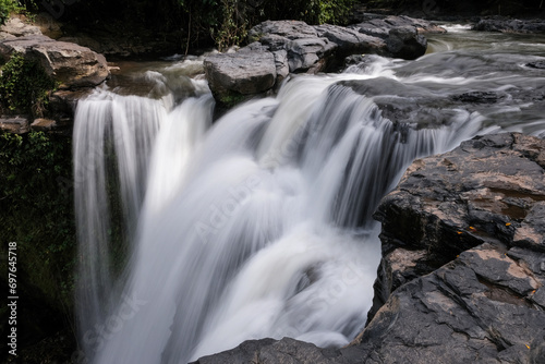 Long exposure shot of upper part of Tegenungan waterfall. Bali  Indonesia.