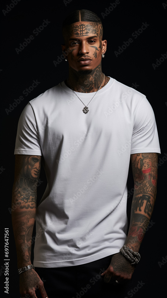 A native male American with tattoos wearing a white T-shirt, posing for a mockup, vertical image A native male American with tattoos wearing a white T-shirt, posing for a mockup, vertical image