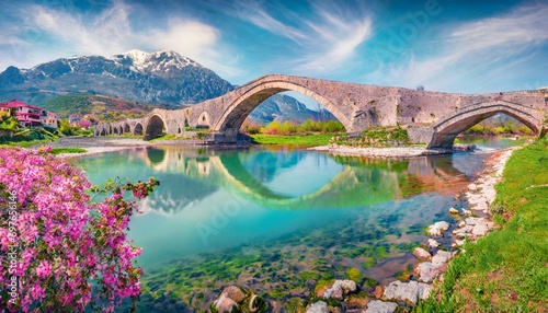 stunning spring view of old mes bridge gorgeous morning landscape of shkoder colorful outdoor scene of albania europe traveling concept background photo