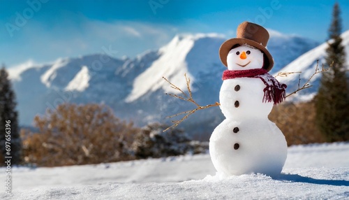 panoramic view of happy snowman in winter scenery close up © Ashley