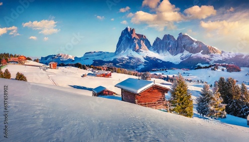 christmas postcard bright winter view of alpe di siusi village with plattkofel peak on background incredible morning scene of dolomite alps spectacular winter landscape of ityaly europe