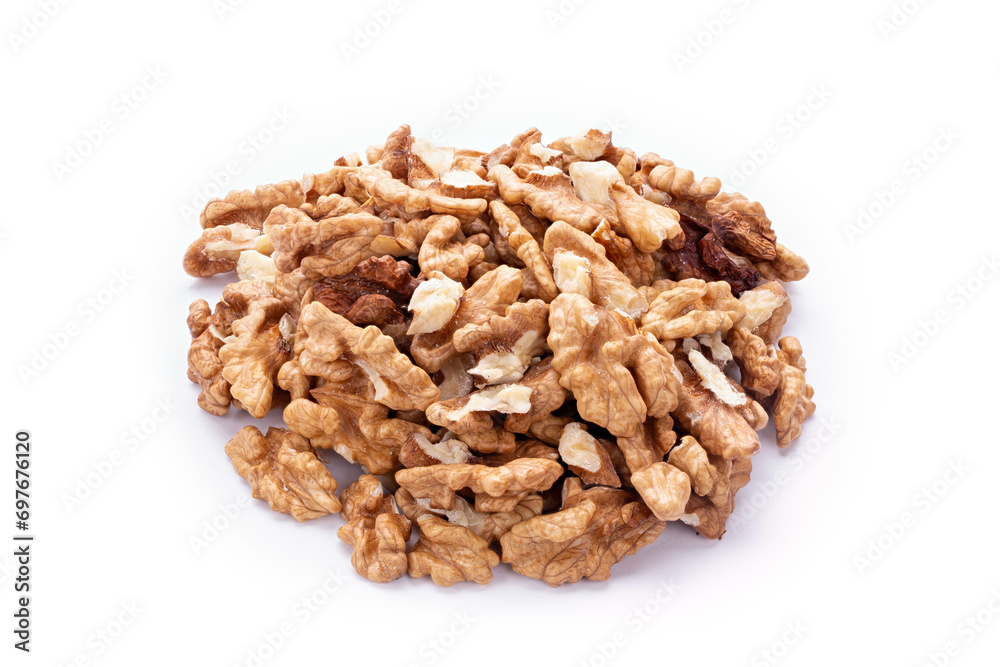 Pile of peeled walnuts, closeup on white background. Pile of peeled walnuts, closeup on white background.