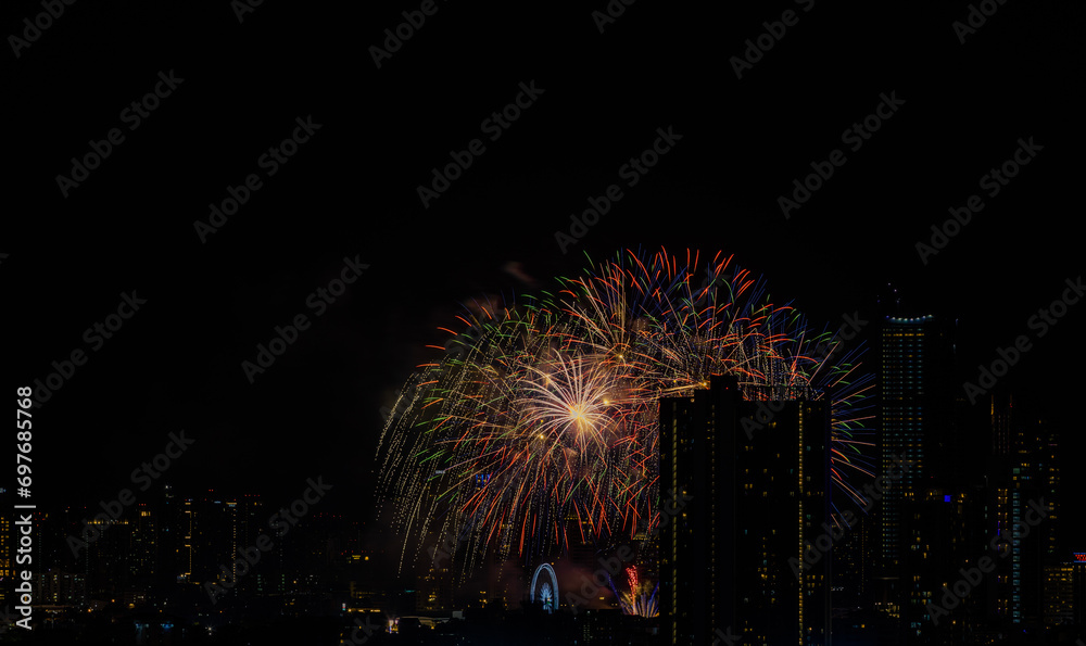 The blurred background of fireworks (light trails) is beautiful at night, seen in the New Year holidays, Christmas events, for tourists to take pictures during public travel. The blurred background of fireworks (light trails) is beautiful at night, seen in the New Year holidays, Christmas events, for tourists to take pictures during public travel.