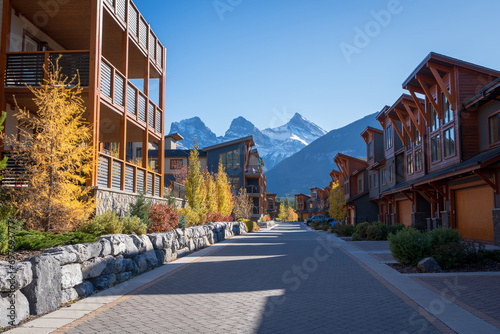 Walking trail in residential area. Town of Canmore street view in fall season. Alberta, Canada. photo