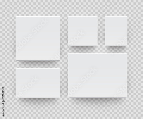 Composition of several different canvas wall displays hanging on the wall. White blank paper sheets with shadows isolated on transparent background. Realistic vector template for your design
