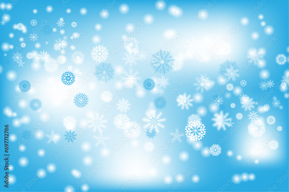 Falling snowflakes on light blue background