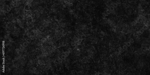Black fabric texture dark surface material carpet abstract pattern background.black rough baking stone from garden decoration stone texture and background seamless 