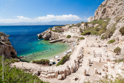 Fototapeta Naklejka Na Ścianę i Meble -  Panoramic view of the ancient sanctuary of goddess Hera, near Loutraki town, in Greece. The rocky beach by the site is popular during summer time