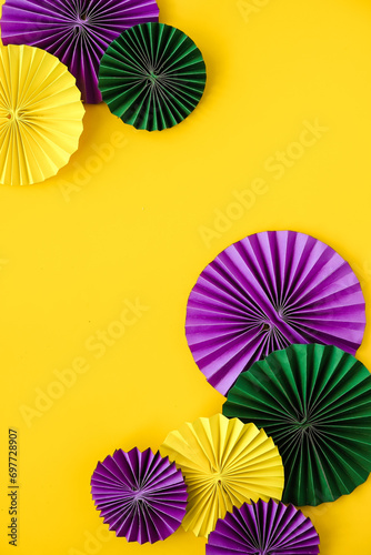 Mardi Gras.Colorful group of Mardi Gras or venetian mask on yellow Mardi gras carnival decoration beads yellow background.