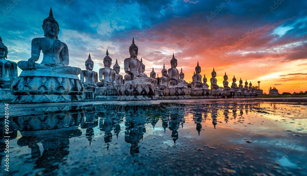 Many Statue buddha image at sunset in southen of Thailand - obrazy, fototapety, plakaty 
