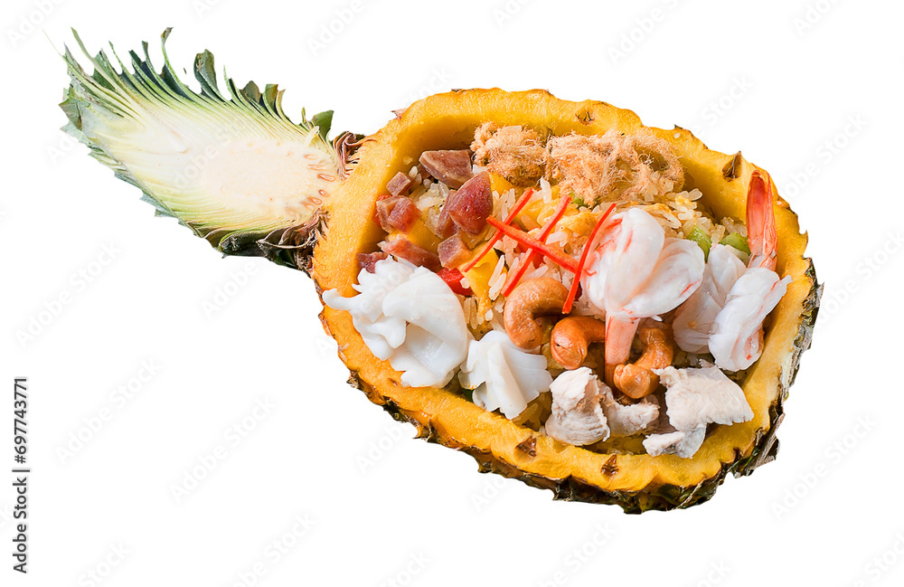 Fried rice with seafood served in a pineapple Fried rice with seafood served in a pineapple