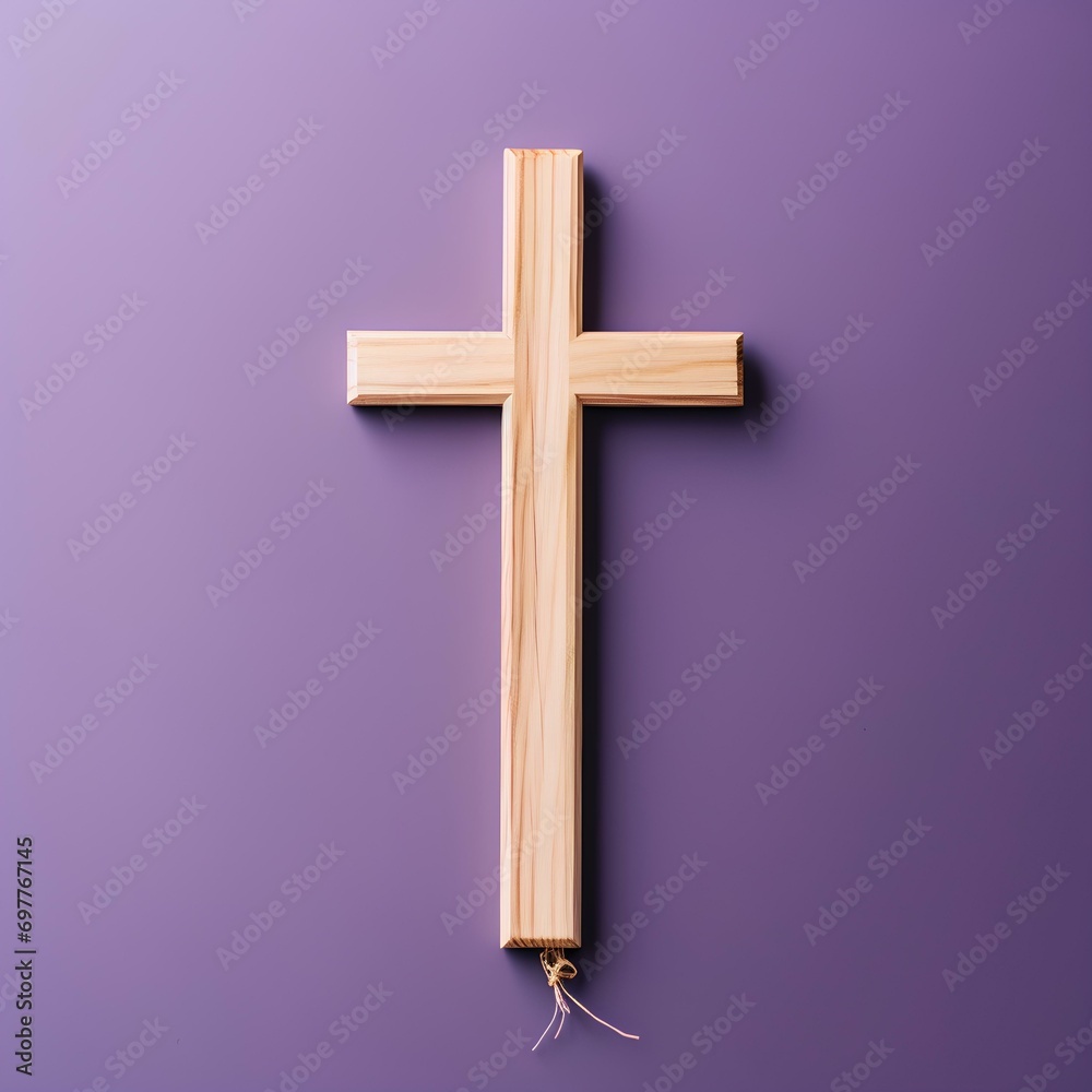 Wooden cross on a purple background, catholic religion concept
