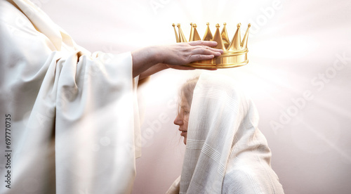 Hands placing a crown on a woman's head photo