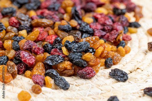Tableau sur toile different types of dried berries on the kitchen table