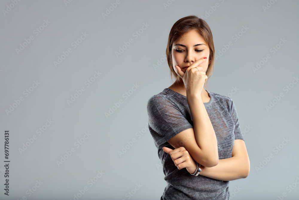 Introspection moment, fingers resting chin Introspection moment, fingers resting chin
