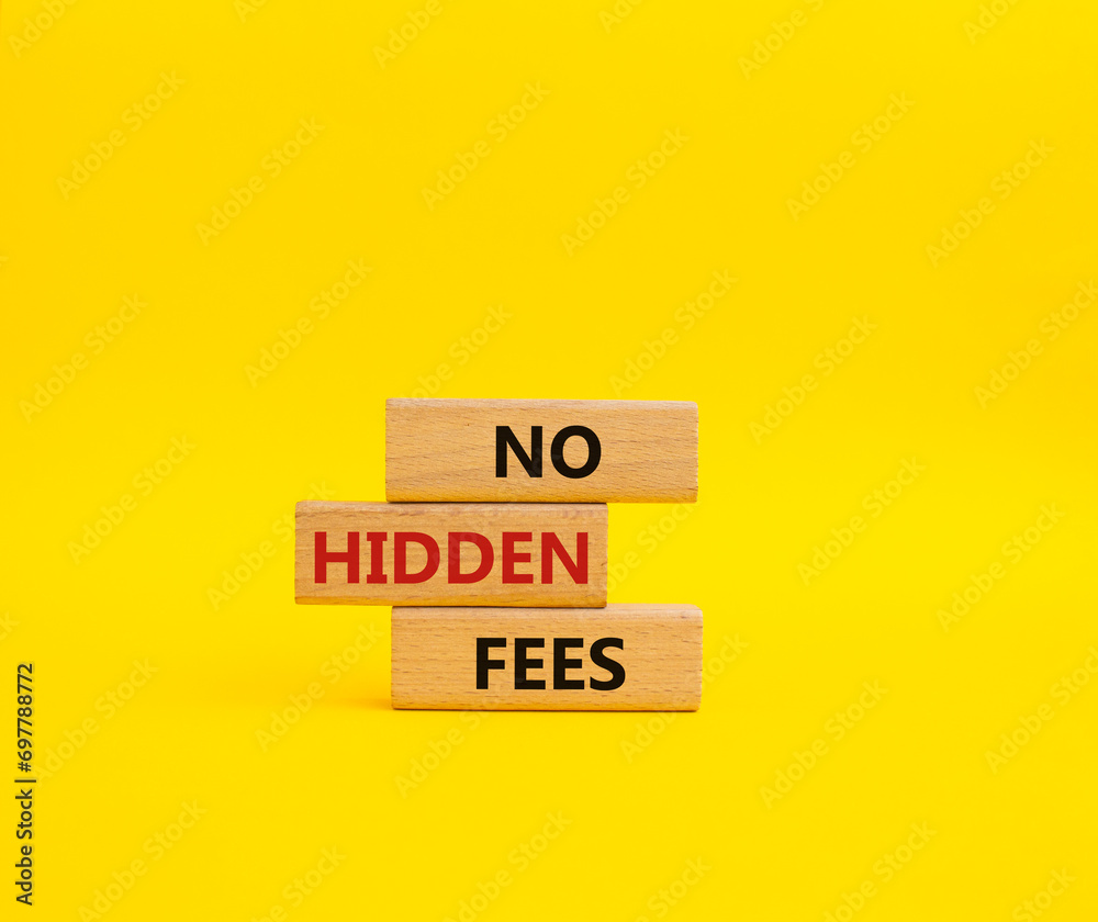 No Hidden Fees symbol. Concept words No Hidden Fees on wooden blocks. Beautiful yellow background. Business and No Hidden Fees concept. Copy space. No Hidden Fees symbol. Concept words No Hidden Fees on wooden blocks. Beautiful yellow background. Business and No Hidden Fees concept. Copy space.