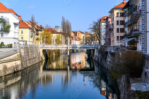 Ljubljanica river across Ljubljana with bridges and historic architecture photo