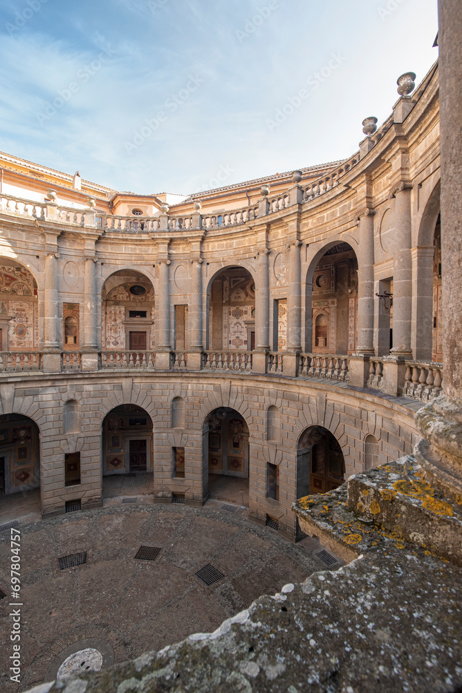 Caprarola, Viterbo, Italy - 2023, September 12: Palazzo Farnese, the internal circular colonnaded courtyard.