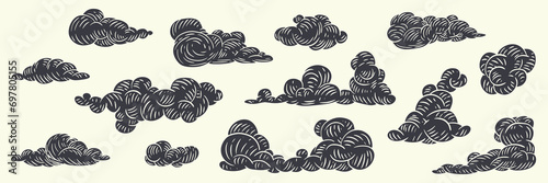 Set of clouds in hand drawn vintage retro style. Cartoon design elements. Vector illustration.